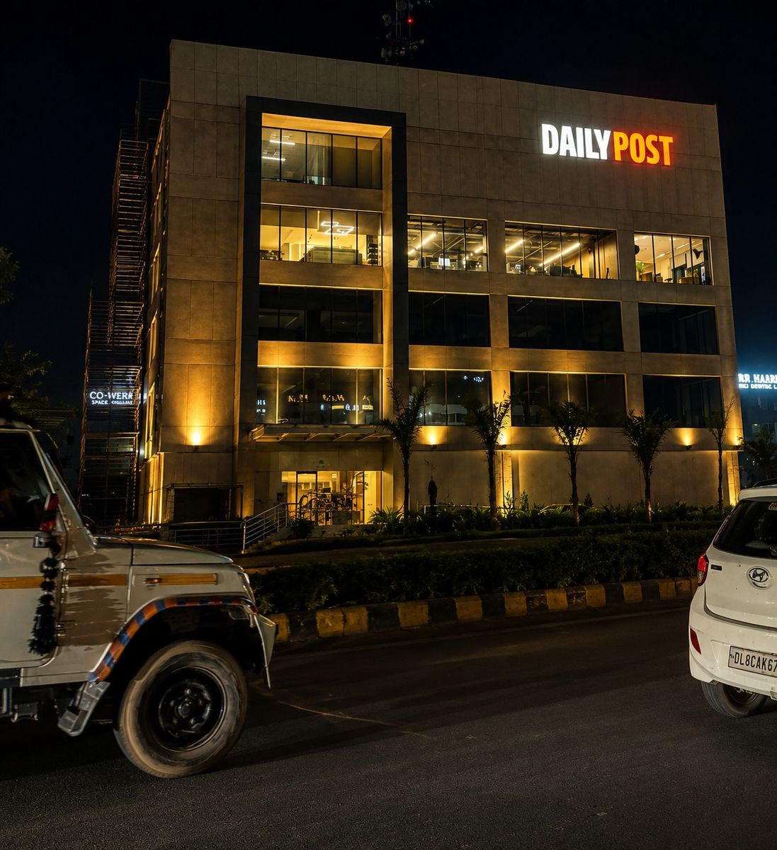 Daily Post illuminated building signage at night